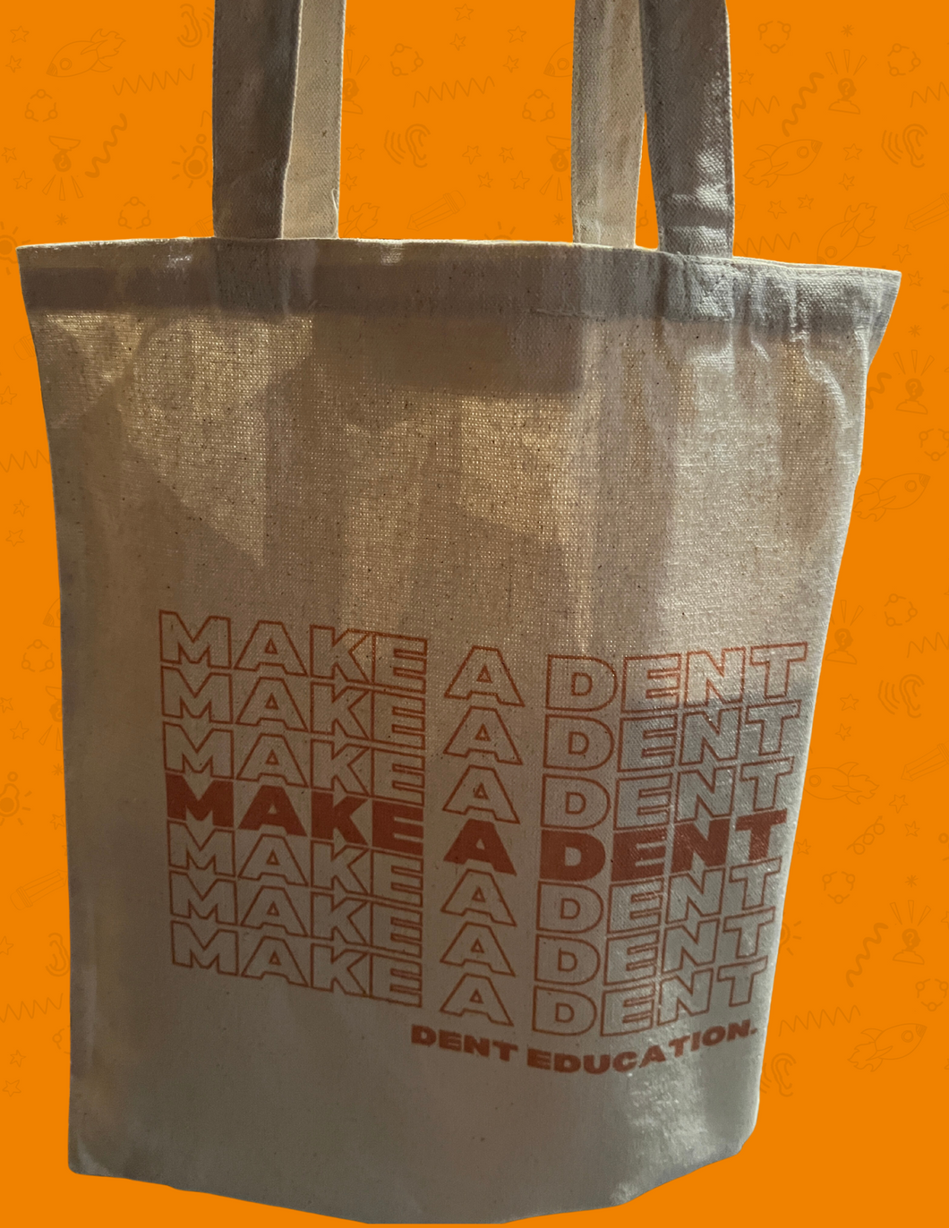 Make a Dent Tote Bag